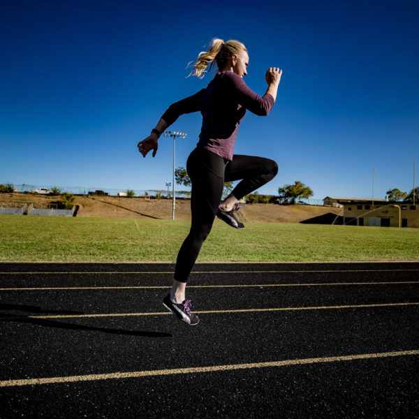 Running, skips, and plyometrics on an outdoor track in Austin, Texas. Kathryn Alexander of Alexander Training.