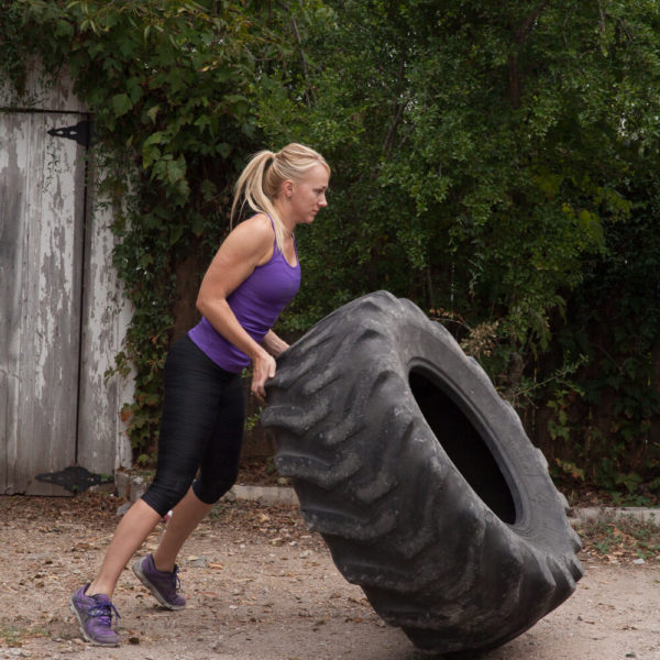 Tire flip, Kathryn Alexander of Alexander Training in Austin, Texas.