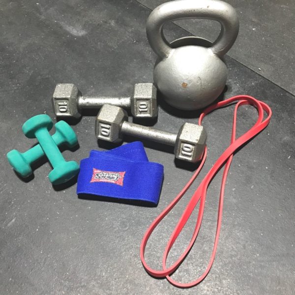 Minimal equipment (kettlebell, bands and dumbbells) for a home training session or workout