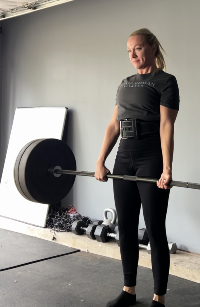 Kathryn Alexander, personal trainer Austin Texas, deadlifts in her garage gym