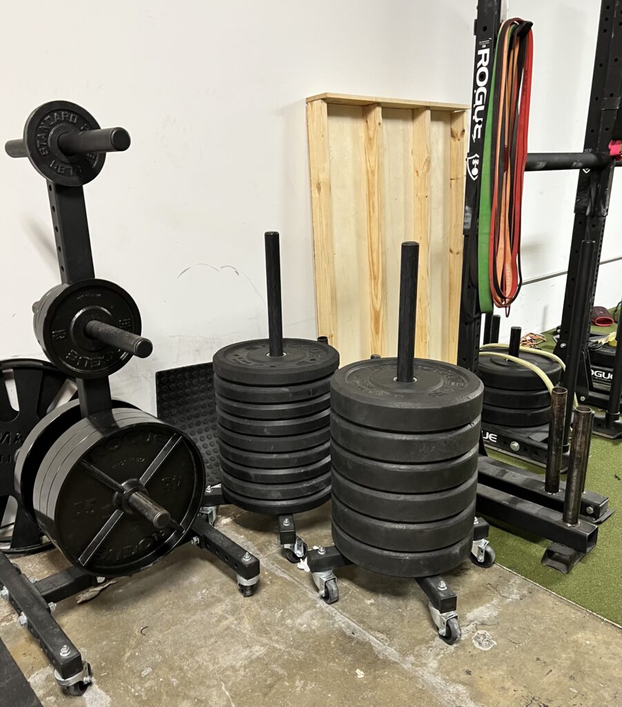 Rolling storage racks for weight plates